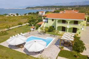 Seaside apartments with a swimming pool Ljubac, Zadar - 11922